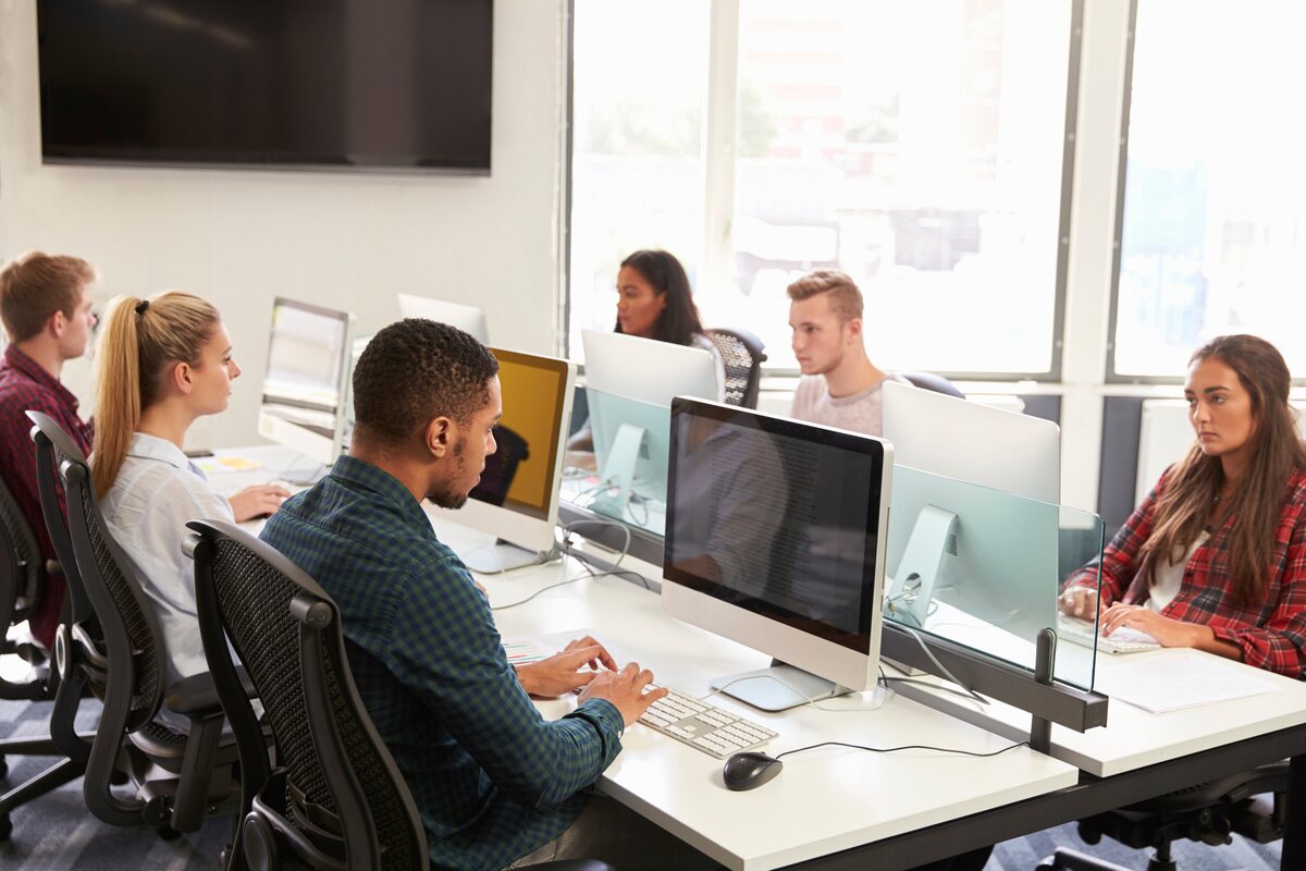 Students learning together in a computer laboratory