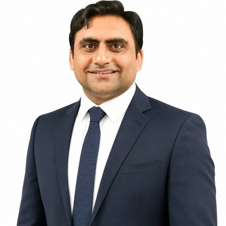 Sukh Sandhu | Career Calling International Sukh Sandhu, a business professional, smiles at the camera.